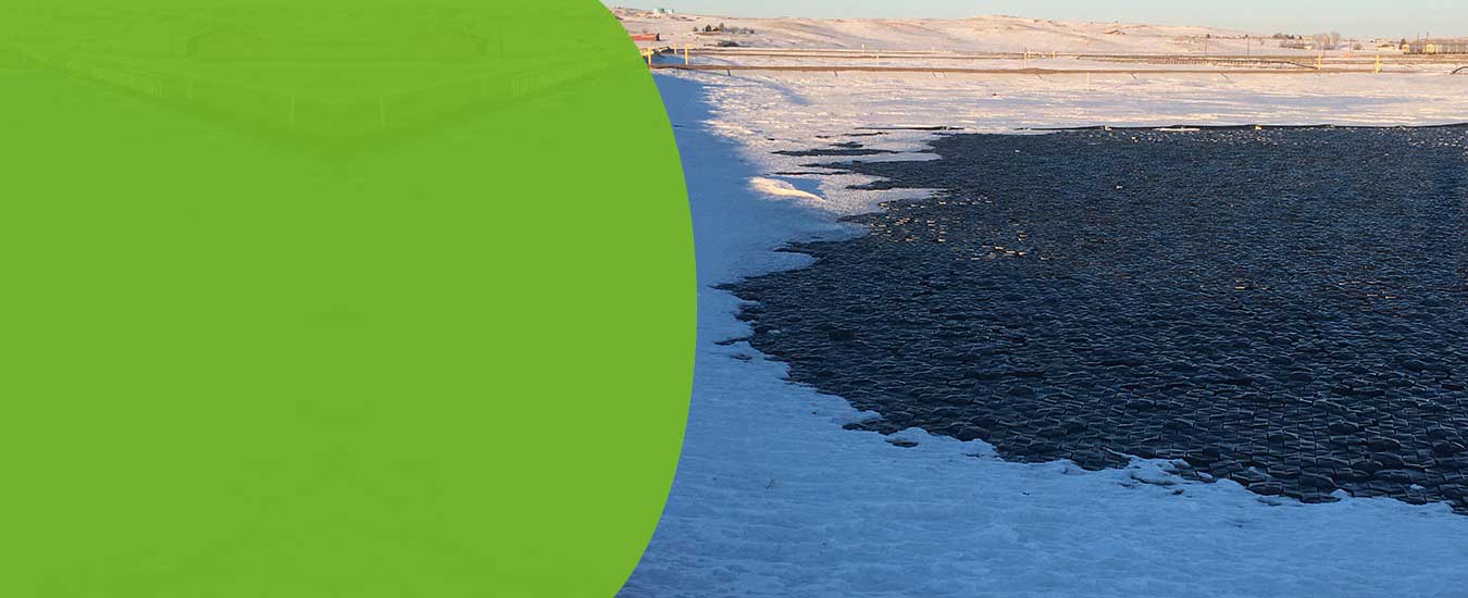Hexprotect MAX R R-17 plus insulated floating cover with closed-cell polyurethane foam insulation deployed on a biogas anaerobic digestion lagoon delivering 90% heating cost reduction and 99% surface coverage