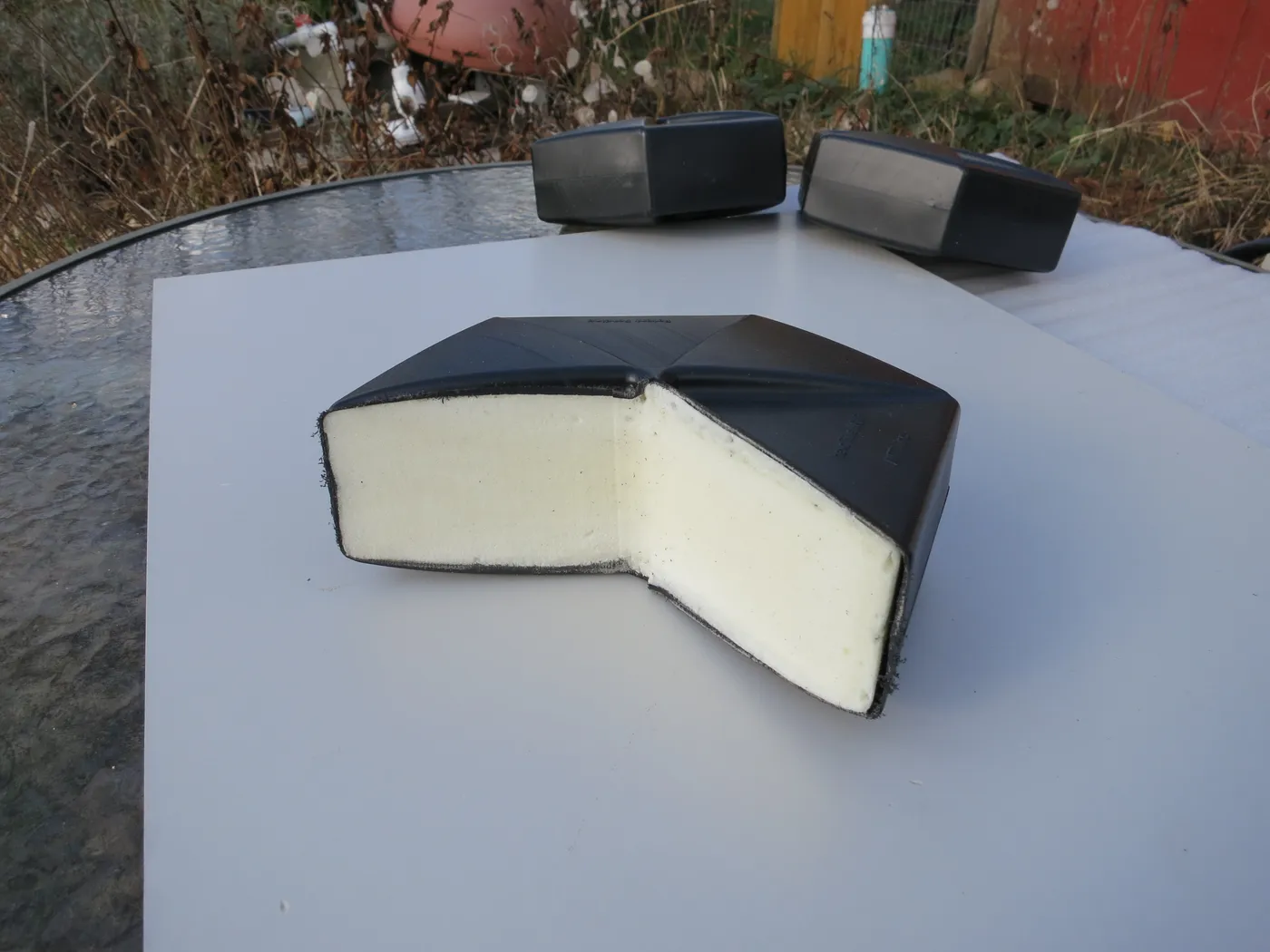 Cross-section of a Hexprotect MAX R tile revealing the closed-cell insulating foam core