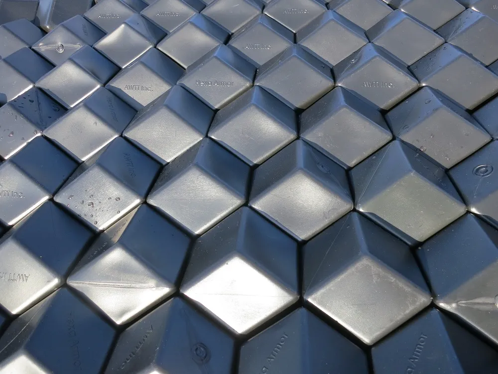 Close-up of interlocking Rhombo Hexoshield rhombus-hexagon tiles achieving 98 percent coverage